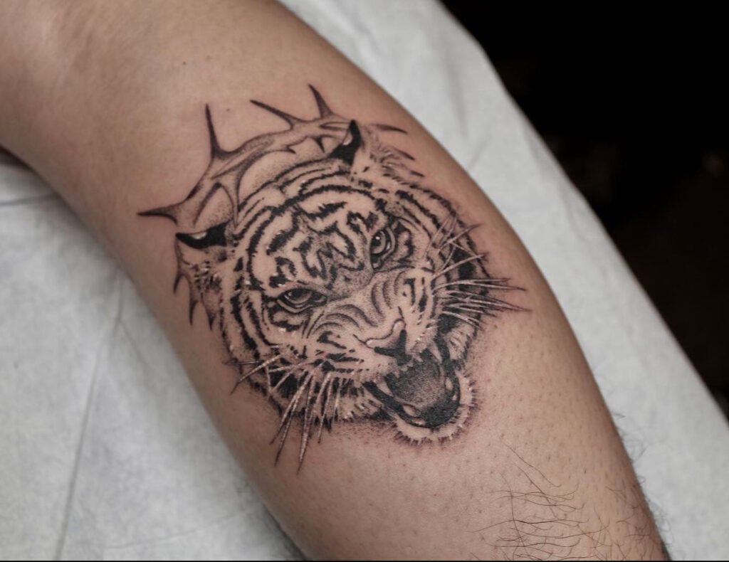 Fineline tiger face tattoo