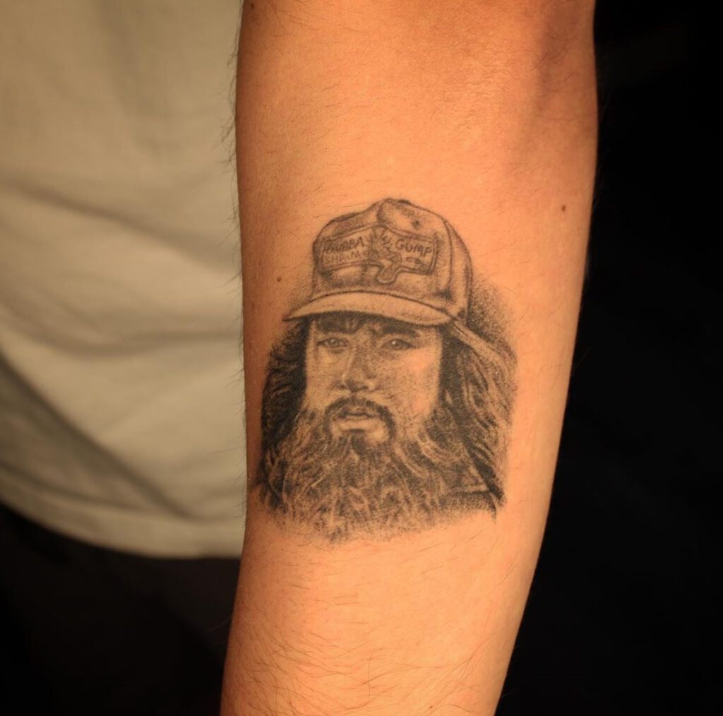 Forrest Gump mini portrait tattoo
